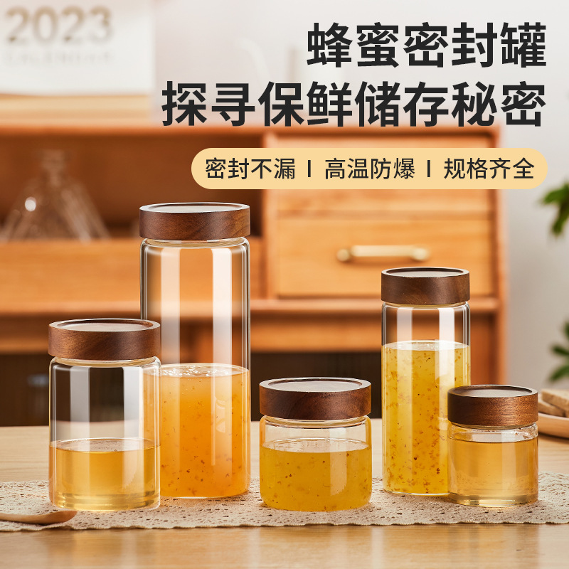 Glass honey sealed jar, household fresh-keeping food grade with lid, canned jam, bird's nest, acacia wood storage jar full figure