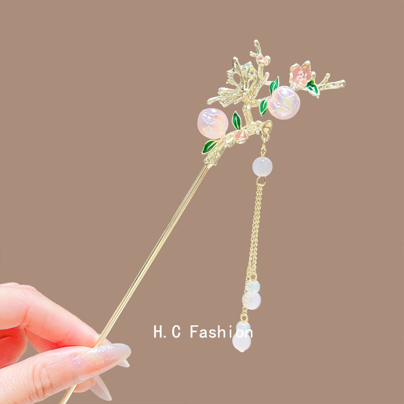 Ancient-style tassel metal hairpins, oil-dripping flower-shaped U-shaped hairpins, new Chinese-style high-end updo hairpin accessories Application Scenario