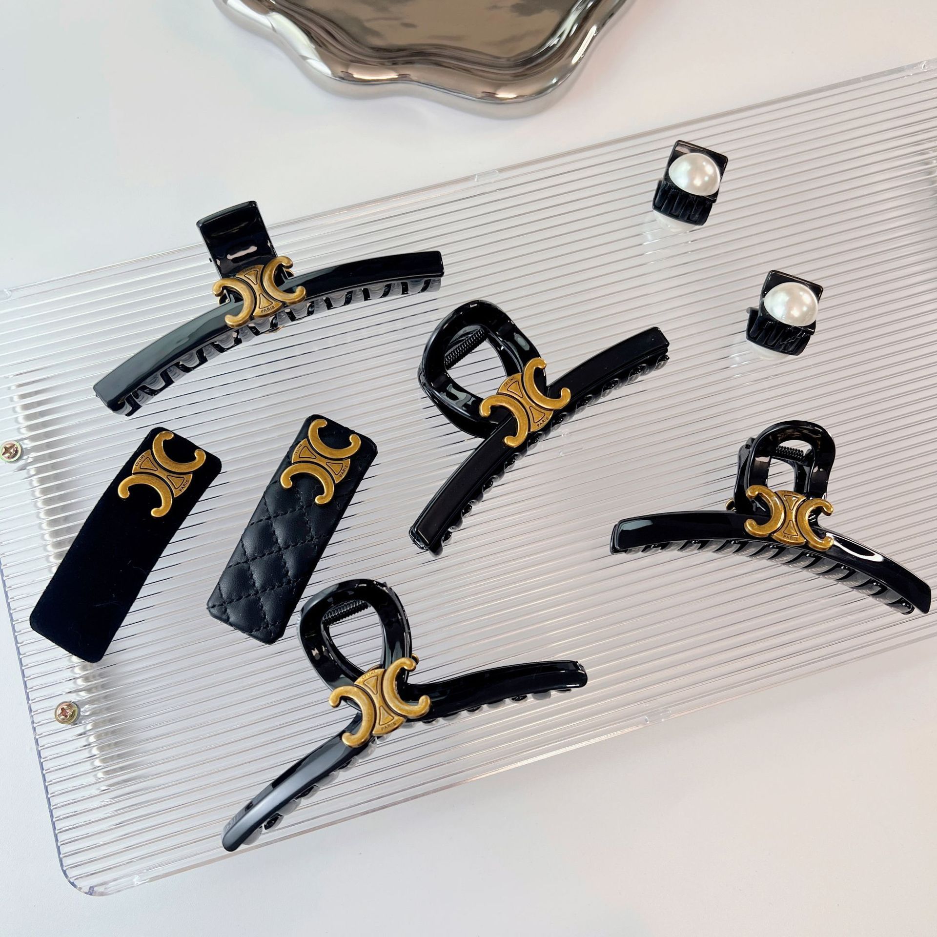 Celi light luxury style Arc de Triomphe black hair clip, high-end retro letter grab clip, acrylic new hair clip and hair accessory Application Scenario