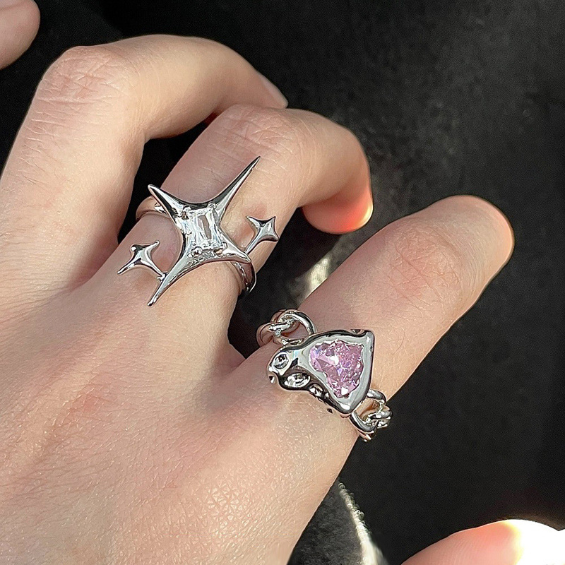 The Korean version of the "Mang Star" ins design ring with a female letter "X" inlaid with zircon texture is a fashionable and individual food ring trend full figure