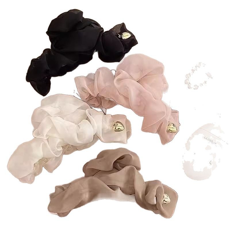 The new super fairy-like mesh hair clip for women's back of the head, with a stylish updo and large shark clip, exudes a sense of sophistication Item Picture