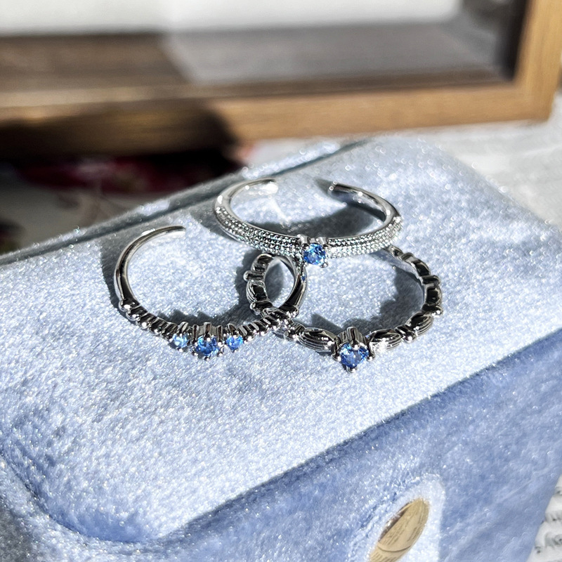 This is a popular and trendy light luxury blue diamond ring with a fine loop for layering, exuding a sense of sophistication. It's a simple, individual and exquisite ring for women Application Scenario
