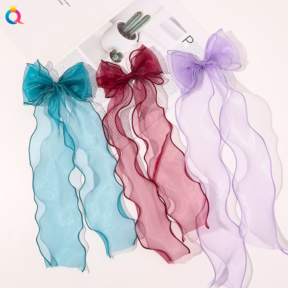 The new bow ribbon duckbill clip from Qiyue is super ethereal and breathable. It features a Japanese, Korean and European root gauze women's hairpin and hair accessory full figure
