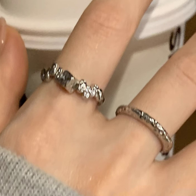 Irregular and cold textured ring, a niche design for women on Instagram, exudes a sense of sophistication and individuality. Stacked ring, a trend in 2023 full figure