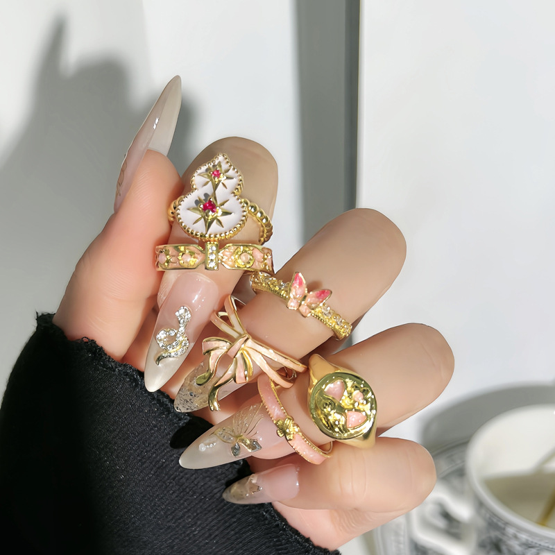 A new sweet pink gradient enamel bow elegant ring, a unique and exquisite index finger ring with a female gourd starlight details Picture