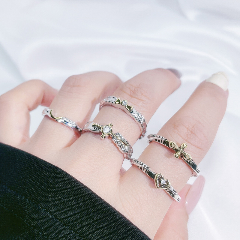 The irregular star-shaped heart-shaped opening ring with a unique color scheme exudes a high-end, trendy and cool vibe for women. It is a neutral and fashionable jewelry and index finger ring details Picture