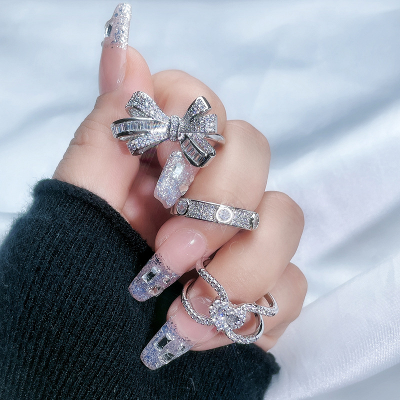 The new light luxury and high-end bow heart-shaped ring for women features a three-dimensional texture, a niche design, and a sweet, cool and fashionable ring trend details Picture