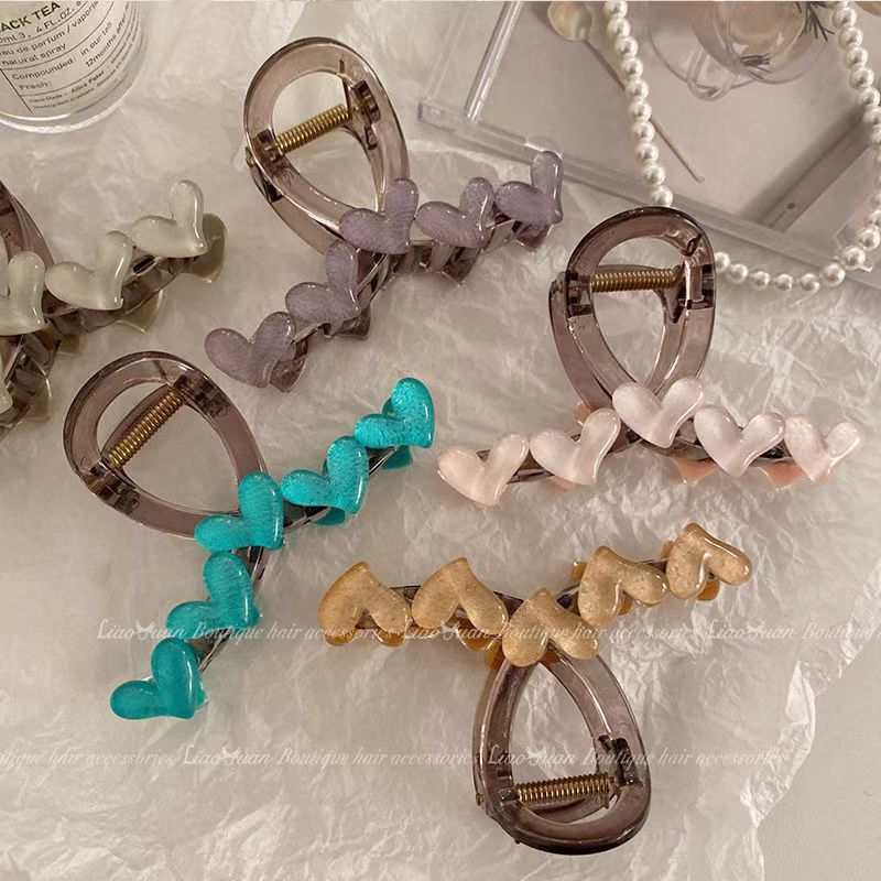The 2024 new high-end shark clip and simple hairpin for the back of the head, featuring the charm of a popular online celebrity details Picture
