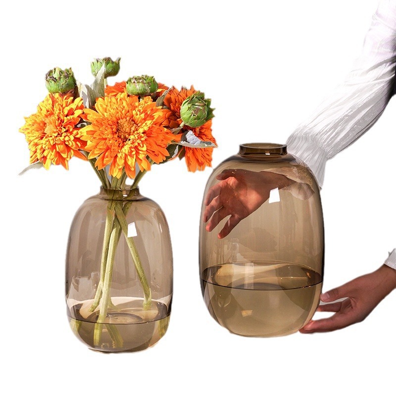 A transparent glass vase for living room flower arrangement, with a high-end look and a high level of appearance. A special fresh flower hanging clock for hydroponic snow willow and magnolia Item Picture