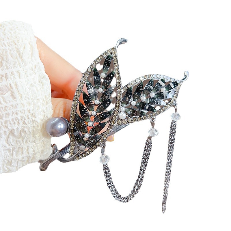 Retro black leaf tassel twist hair clip at the back of the head, new super fairy updo one-button, high-end frog clip Item Picture
