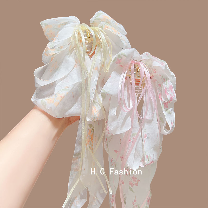 Pastoral style floral ribbon bow ponytail clip for women to show off hair volume, sweet semi-tied hair clip, elegant hair accessory Application Scenario