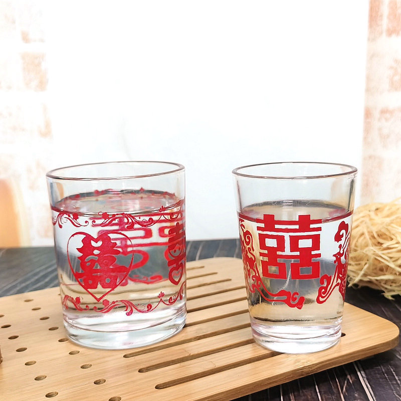 Wholesale of printed glass white spirit cups, wedding celebration characters, banquet wine cups, spirits cups, printed pattern tempered glass cups full figure