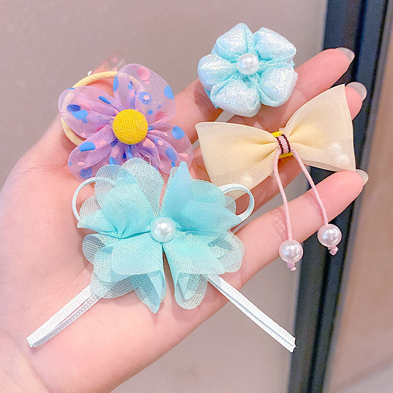 New Korean version of children's hair accessory set, super fairy-like bow, hair-safe tie, flower baby hair band, hair tie Application Scenario