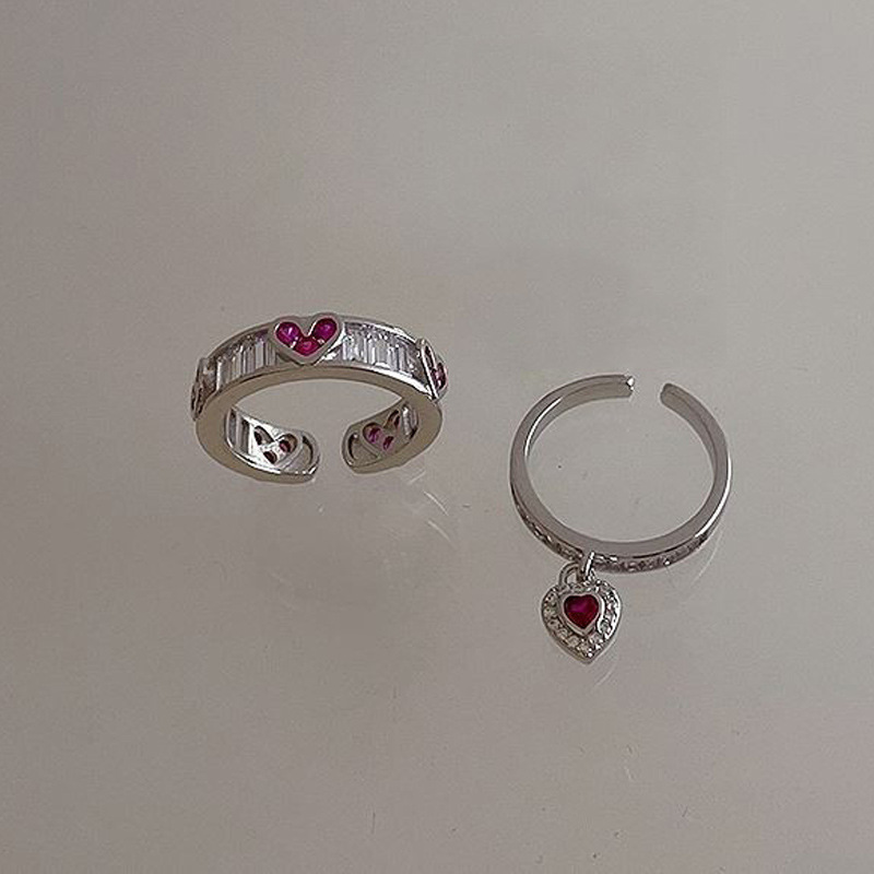 This light luxury and high-end heart-shaped zircon open ring features a niche design, a simple and individualistic style, and an ink-style, cool vibe details Picture