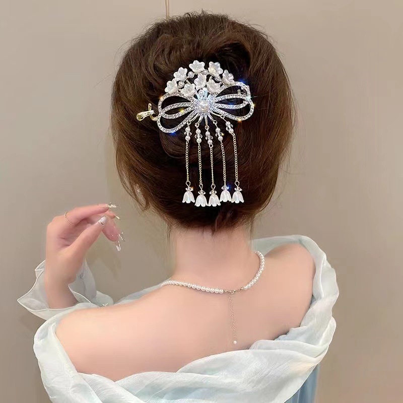 Exquisite tassel clip women's new lily of the valley flower hairpin bun hair clip back head twist clip full figure