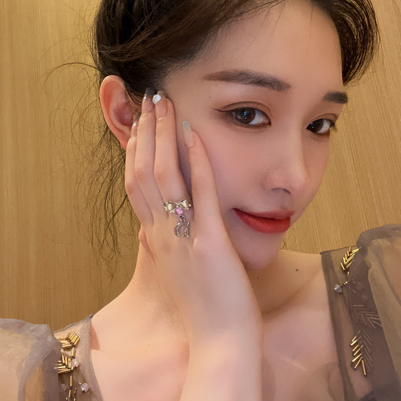 A niche design of a pink zircon open-top ring for women on Instagram, with a cold and elegant style, light luxury, trendy and high-end feel details Picture