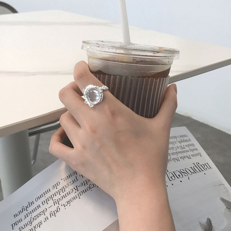 A light luxury, niche, retro moonstone inlaid open ring with tin foil, a cold and elegant texture ring, fashionable and trendy for women details Picture