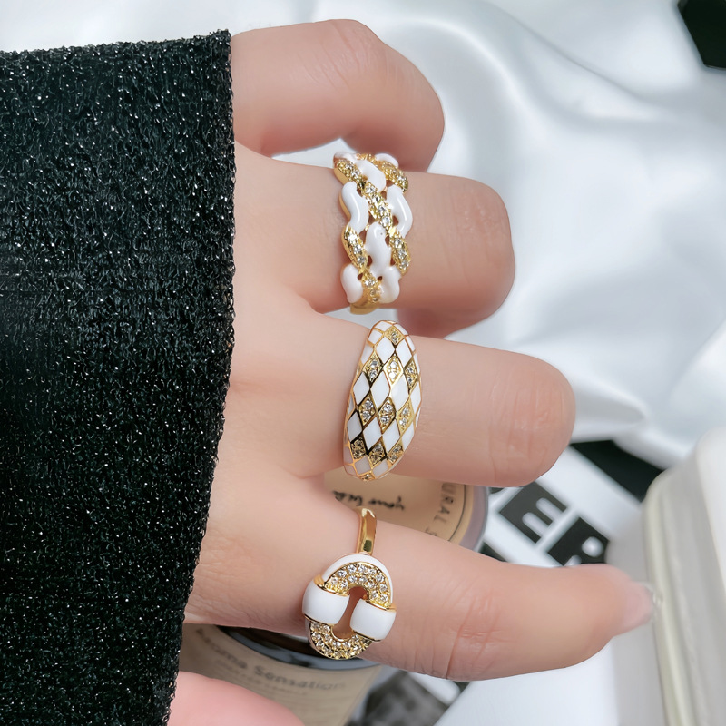 This exquisite diamond-encrusted diamond-shaped geometric drip glaze open ring exudes a unique and high-end French style for women. It is a trendy and stylish ring details Picture