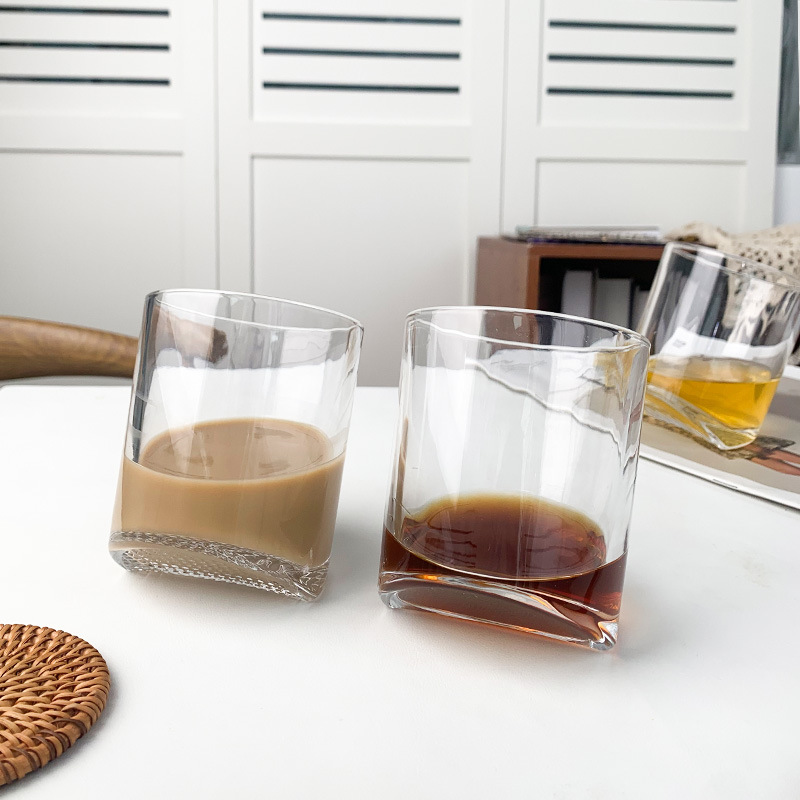 Creative tilted whisky cup, home cocktail cup, wine bar sweet wine glass, creative coffee cup details Picture