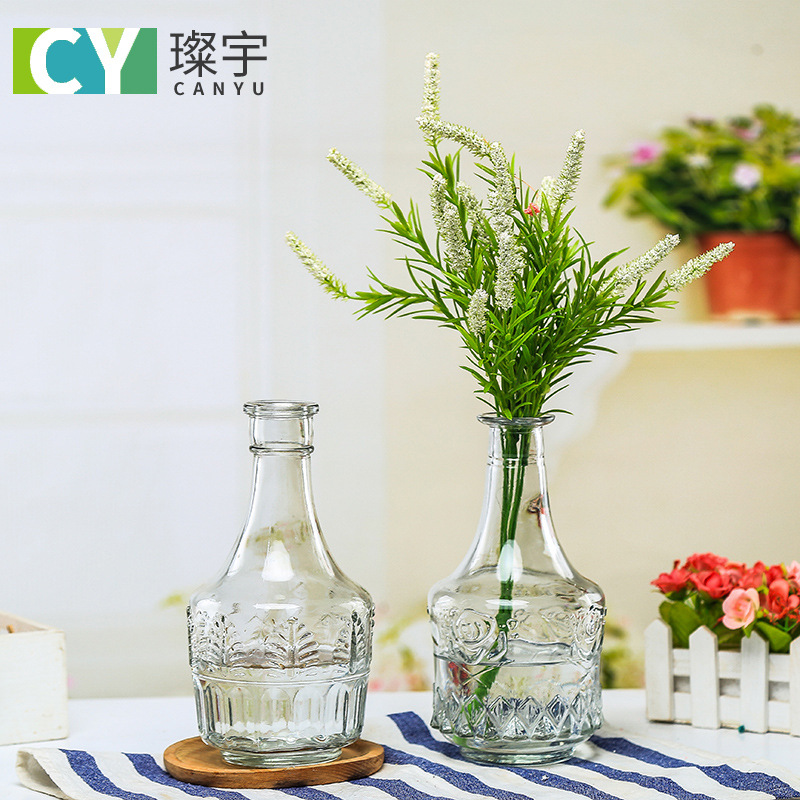 Creative wine bottle vase, simple transparent glass vase, ins fresh and simple dining room and living room decoration handicraft details Picture
