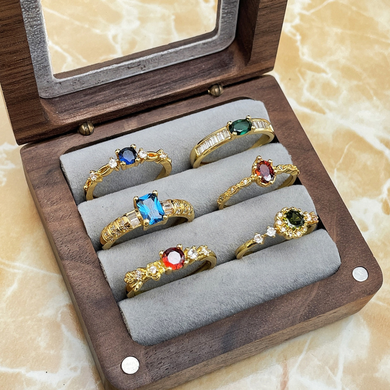 The cross-border colored gemstone series features a light luxury and fashionable open-top ring. It is simple and elegant for women, highlighting a fair complexion and exuding a refined and unique charm. It is a trendy and versatile ring Application Scenario