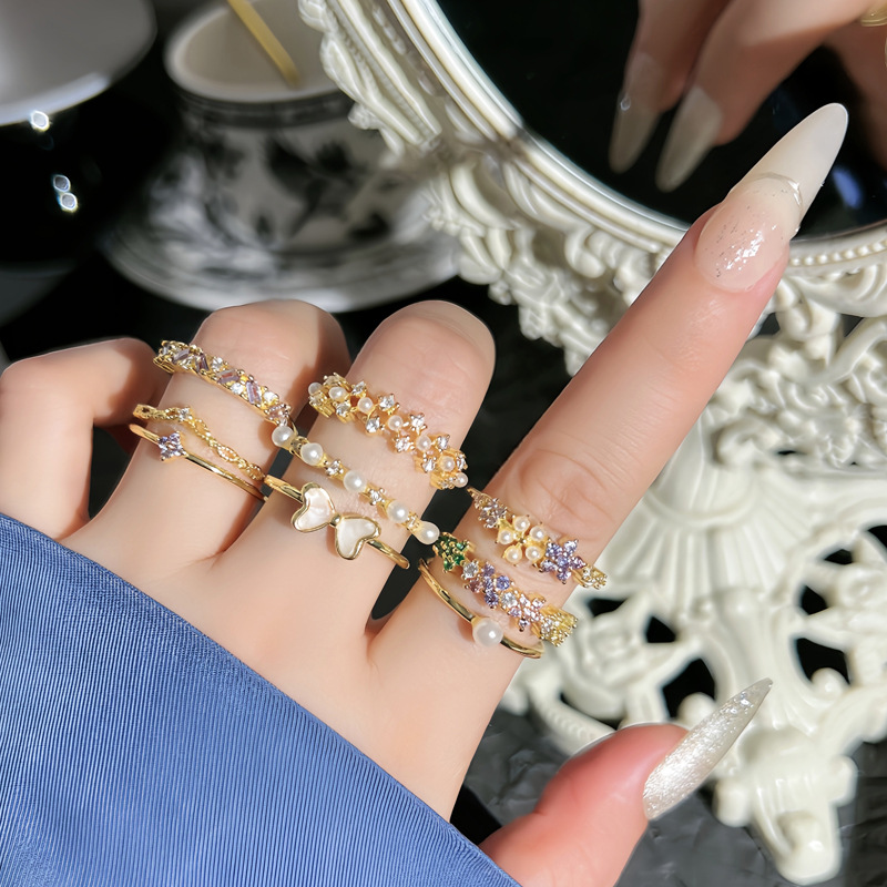 Korean-style light luxury small diamond pearl inlaid elegant ring, women's bow, niche design, sweet and cool, versatile ring details Picture
