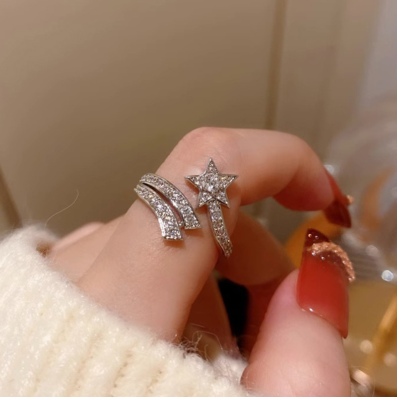 This light luxury and high-end full-diamond zircon star opening ring is worn by a woman in layers, exuding a sweet and cool temperament and a unique texture. It's a trendy index finger ring Application Scenario