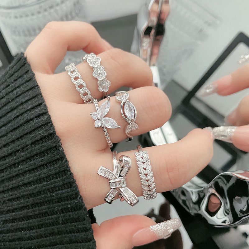 A niche and light luxury butterfly fashion full-diamond open-top ring for women, exquisitely layered and unique floral sweet and cool style index finger ring full figure