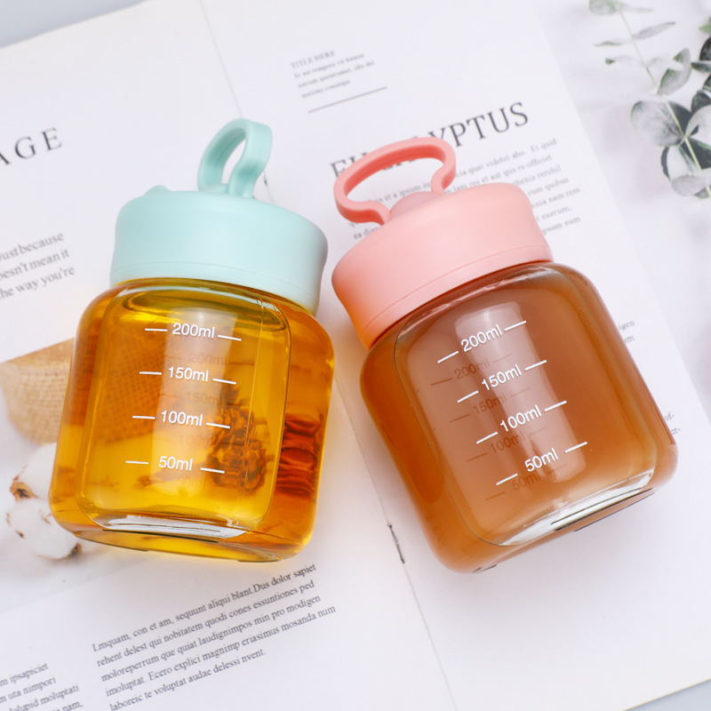 Children's mini glass water cup, soy milk cup, milk tea cup, mobile phone stand cup, chubby cup, portable and cute shaker cup Application Scenario
