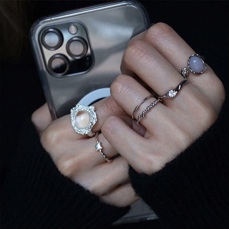 A small diamond, exaggerated gemstone, crystal, irregular-shaped, high-end, niche design ring with a cold style, a woman opens her mouth full figure