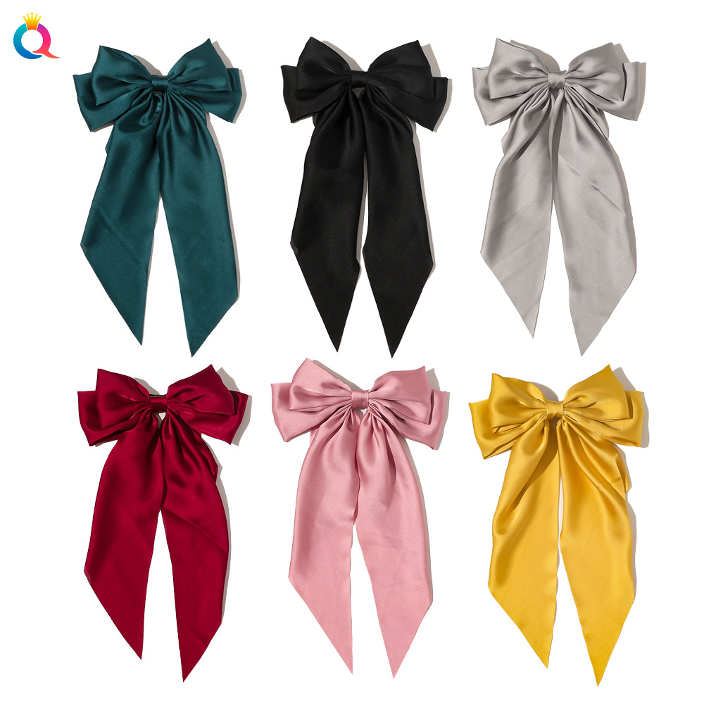 The new cross-border bow ribbon hair clip from Qiyue Korean Edition is a simple and elegant silk silk spring clip hair accessory at the back of the head full figure