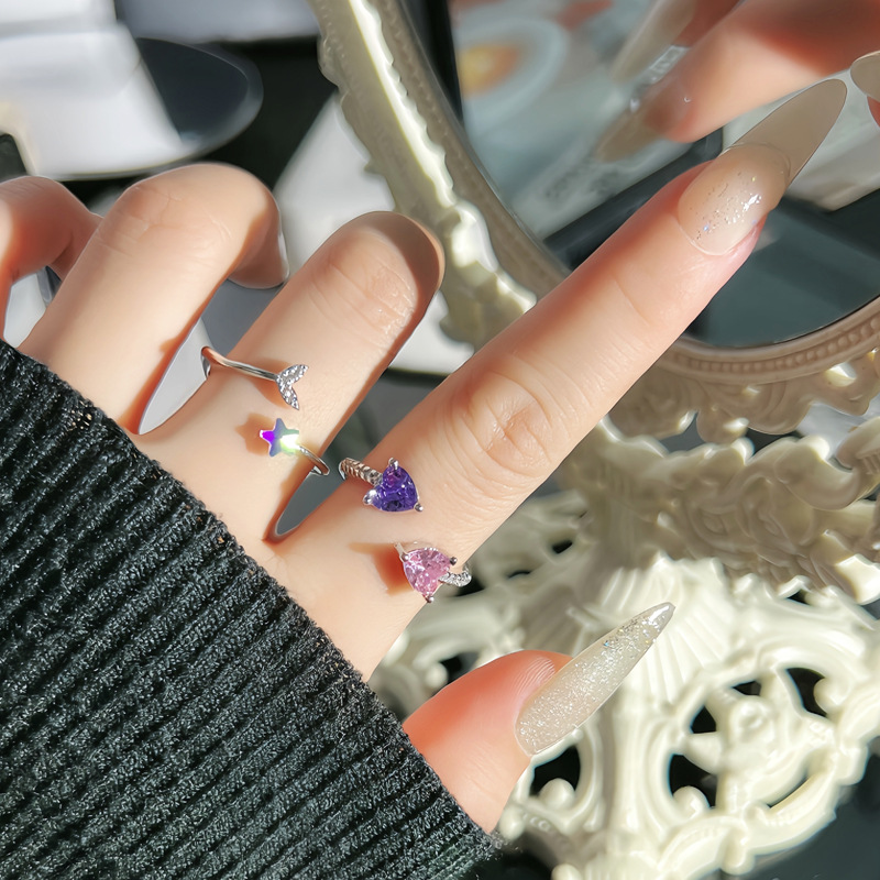 A sweet double heart pink and purple zircon open ring with a female star fish tail, exquisitely stacked, is a trendy and fashionable index finger ring full figure