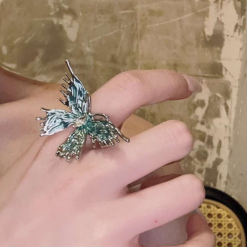 Unique and elegant liquid blue butterfly ring, a light luxury and niche drip glaze open ring for women, a fashionable and individual versatile accessory full figure