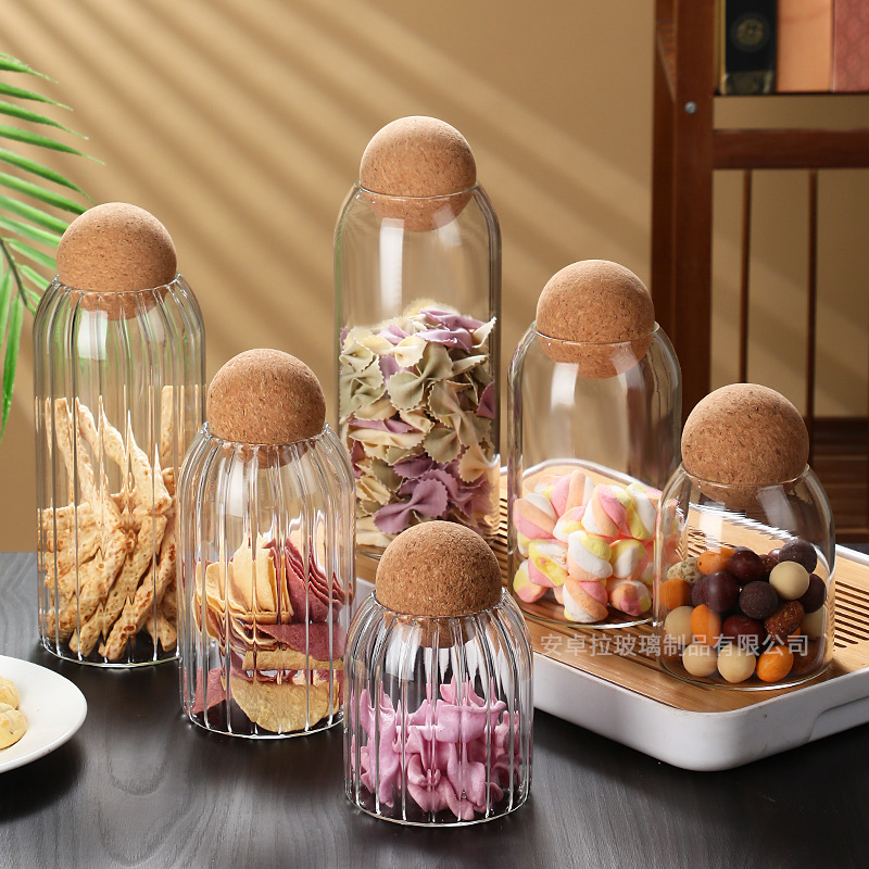 The manufacturer supplies striped glass storage jars, round wooden stopper jars, flower tea sealed jars, candy jars and coffee bean storage boxes Specification drawing