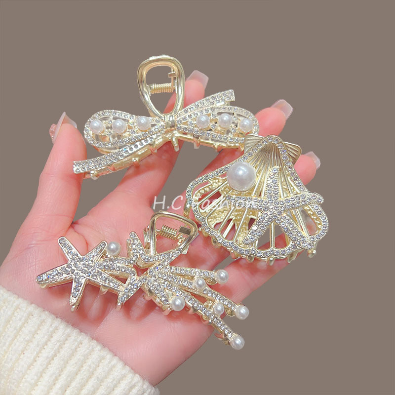 New medium-sized bow wheat ear hair gripper, simple and versatile, with a high-end semi-tied shark clip accessory Application Scenario