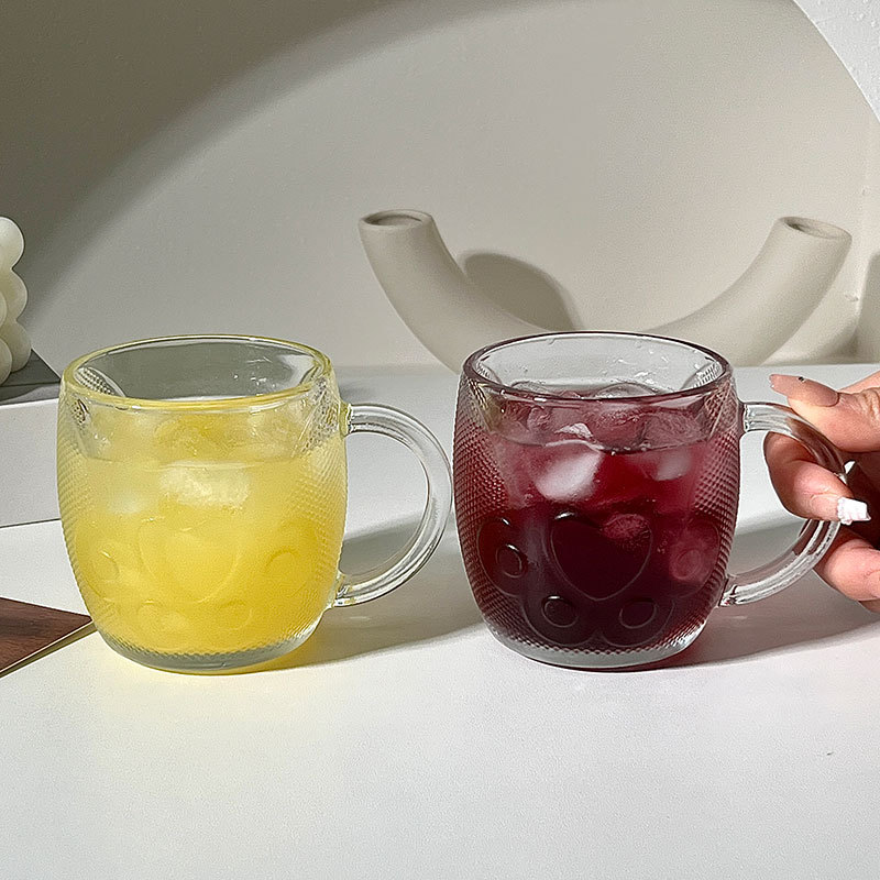 Creative cat paw glass cup, high appearance level drinking cup, light luxury high-end milk and juice cup, commercial coffee cup with handle details Picture