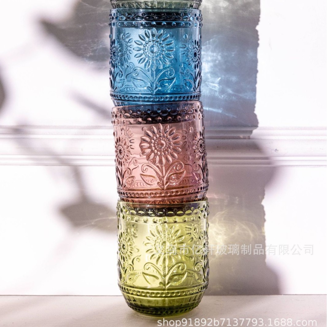 Factory wholesale vintage embossed sunflower colored glass water cups, sunflower household milk and juice cups, cold drink cups Application Scenario