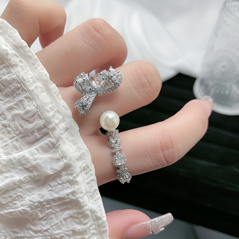 European and American ins niche light luxury diamond-encrusted bow pearl open ring, fashionable, versatile and high-end food ring for women details Picture