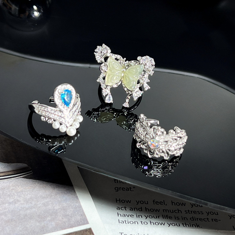 New Chinese-style court-style chalcedony butterfly high-end ring, women's hollowed-out light luxury water drop sea blue zircon exquisite ring Specification drawing