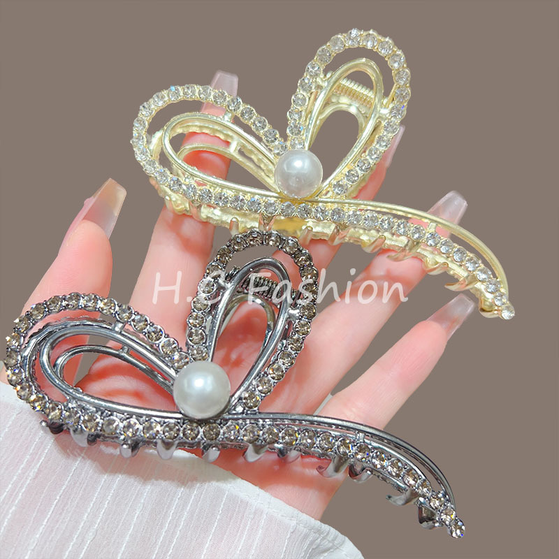 A new versatile shark clip headpiece that exudes a high-end and elegant feminine charm with a heart-shaped claw clip Specification drawing