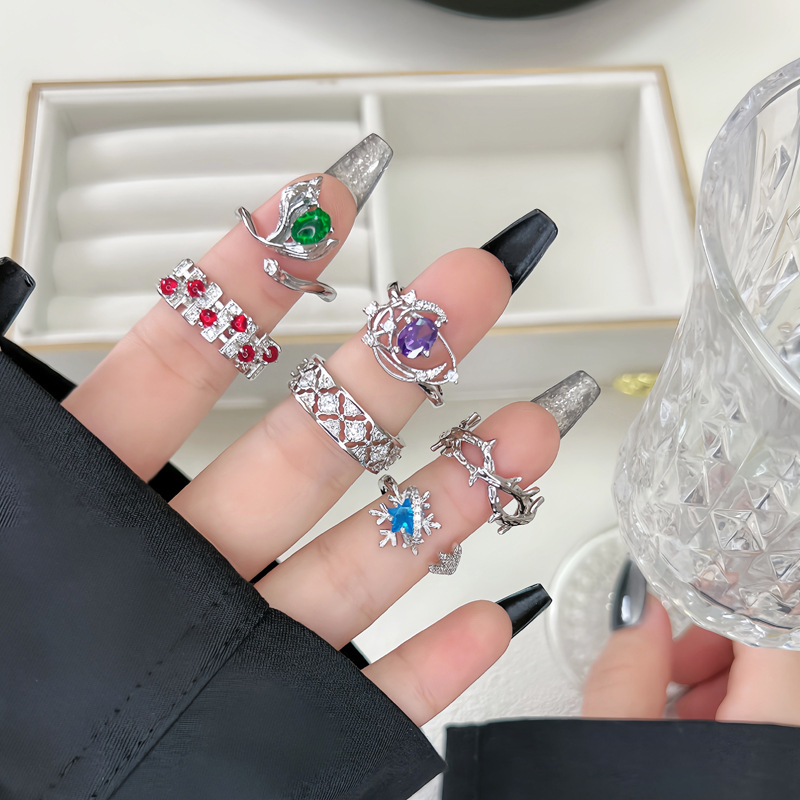 Hot-selling niche and light luxury color micro-inlaid sweet and cool open ring, women's fashionable hollowed-out flower style layered index finger ring details Picture