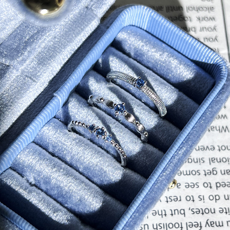 This is a popular and trendy light luxury blue diamond ring with a fine loop for layering, exuding a sense of sophistication. It's a simple, individual and exquisite ring for women Specification drawing