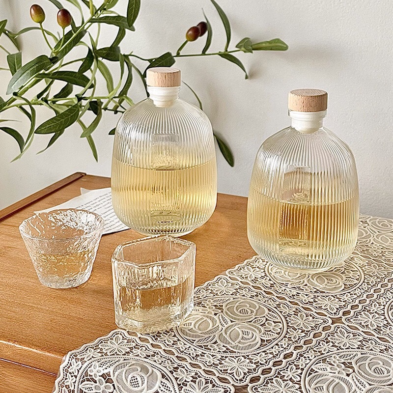 Wholesale of high-appearation-level glass empty wine bottles, self-brewed fruit wine, green plum and bayberry wine, portioned and sealed glass bottles Application Scenario