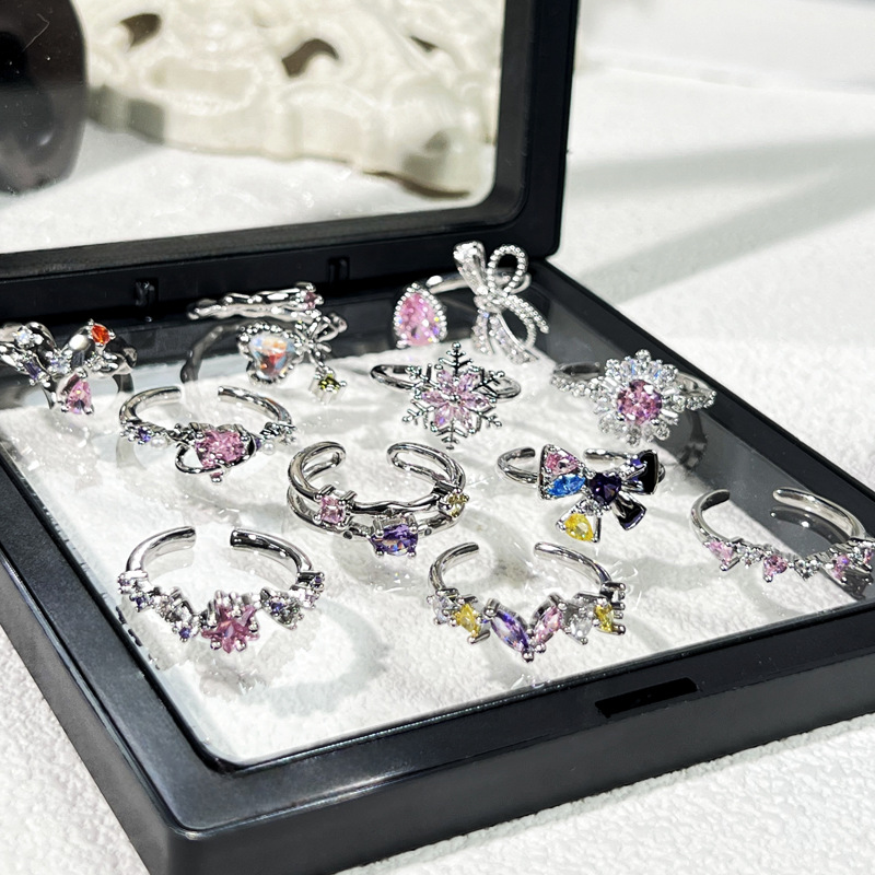 A Korean-style, sweet and cool pink diamond bow open ring with a touch of high-end sophistication and a light luxury style on Instagram Application Scenario