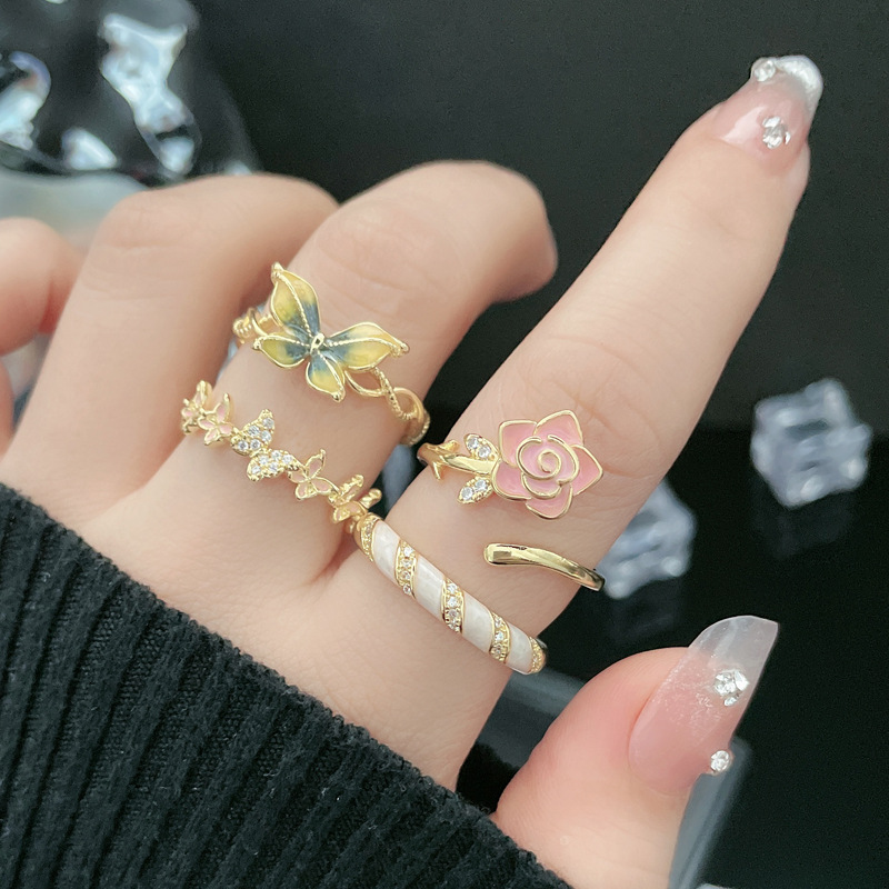 French niche retro sweet and cool butterfly opening ring, a fashionable rose-patterned glaze ring accessory that makes women look fair and elegant Application Scenario