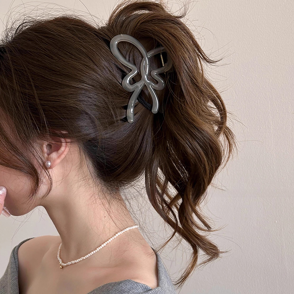 Jelly-colored hollowed-out butterfly hairpin for women, 2025 new high-end style, back of the head hairpin, shark clip hair accessory Application Scenario