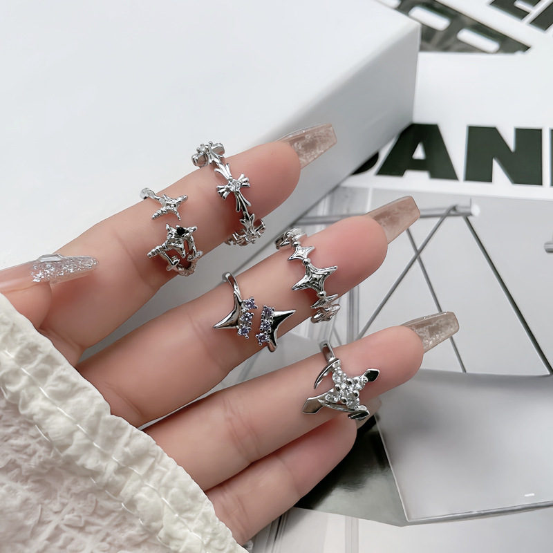 The ring is a simple and fashionable irregular cross for women, with a unique and versatile personality. It is a trendy and cool accessory with a cold style on Instagram full figure