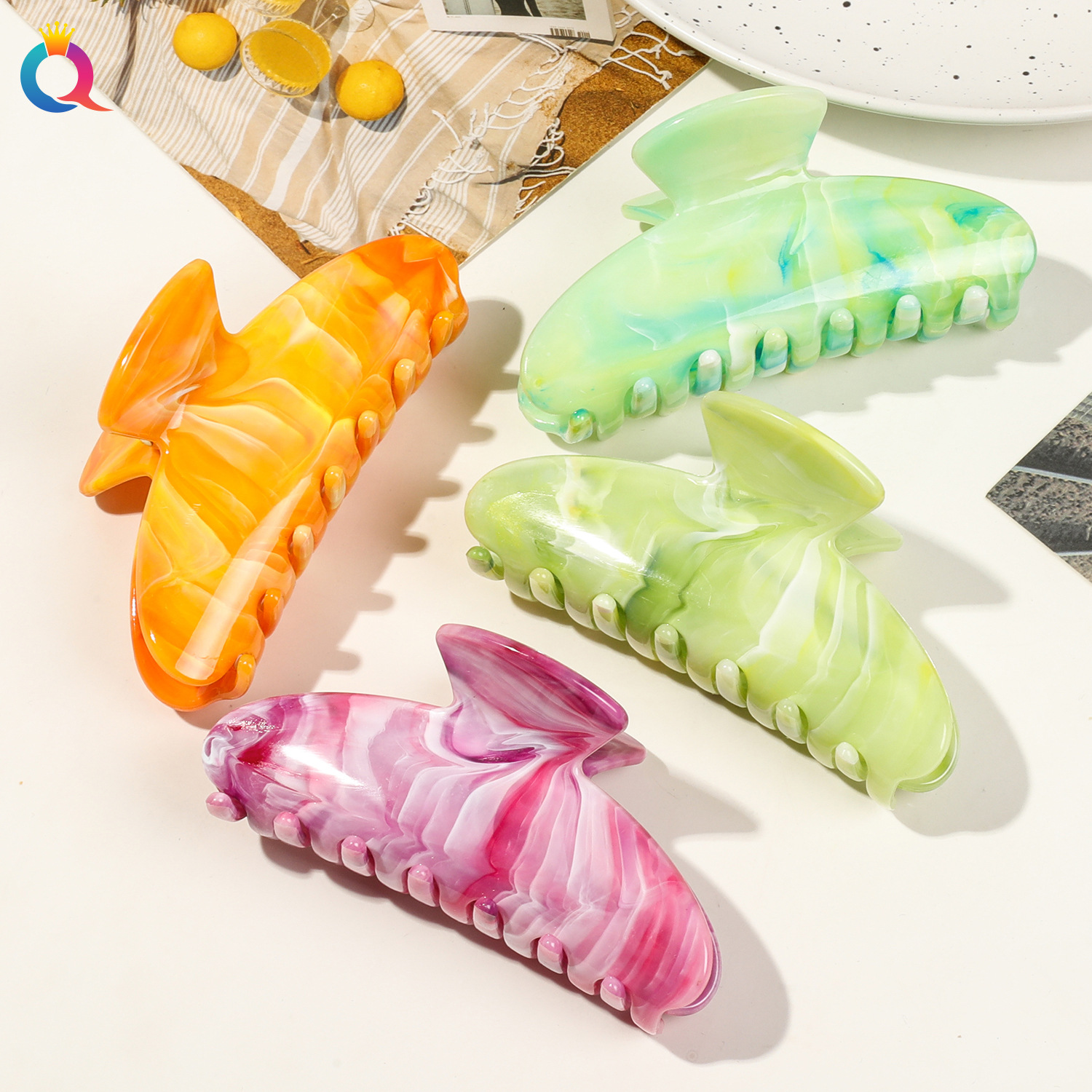 Wholesale of Qiyue Cross-border large gold coin square head marble-patterned grabbers, simple ponytail updo hair clips, and women's shark clips Application Scenario