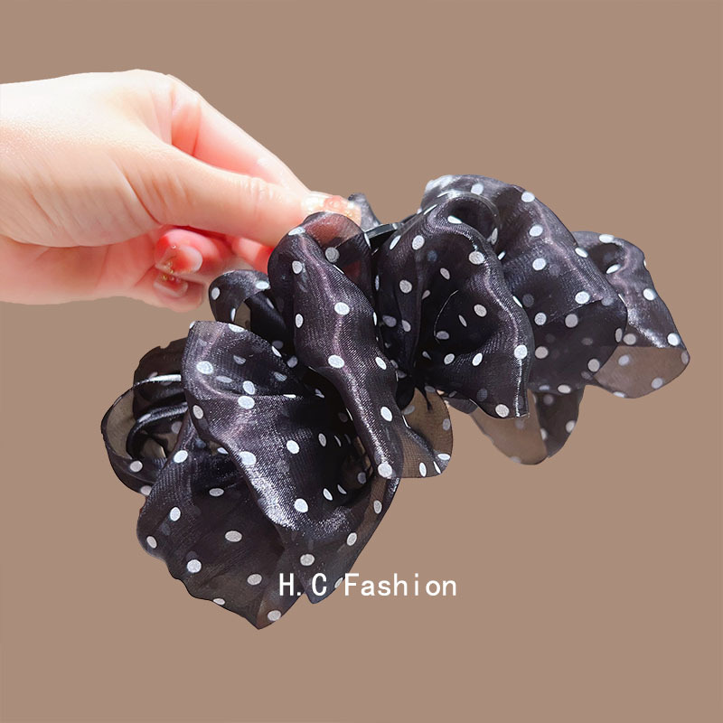 Elegant Korean-style polka dot large scratch-clip, high-end female hairpin, bow bun hairstyle at the back of the head, elegant shark clip Application Scenario