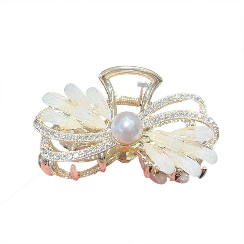 The high-end bow and glass clip is simple and versatile for women. It is a delicate shark clip accessory with a hairpin on the back of the head Item Picture